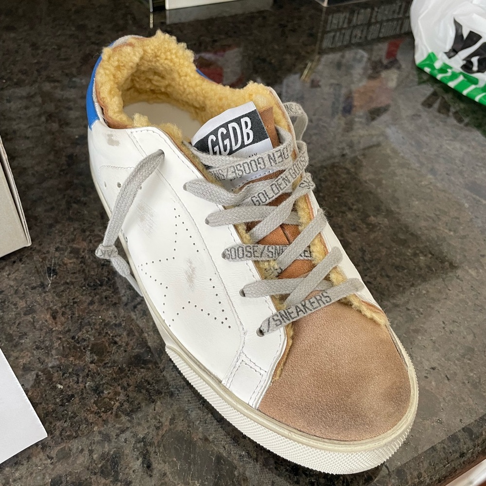 NIB with dust bag and passport. Never worn. Too small for me. Size 38. Paid $680